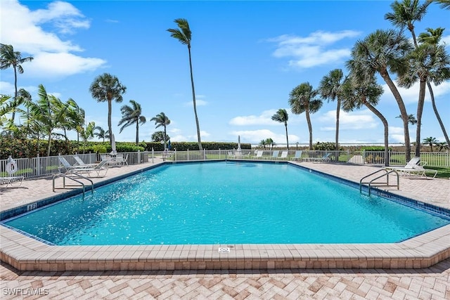 220 Seaview Ct Unit 305, Marco Island, FL 34145 - pool with fence and a patio area