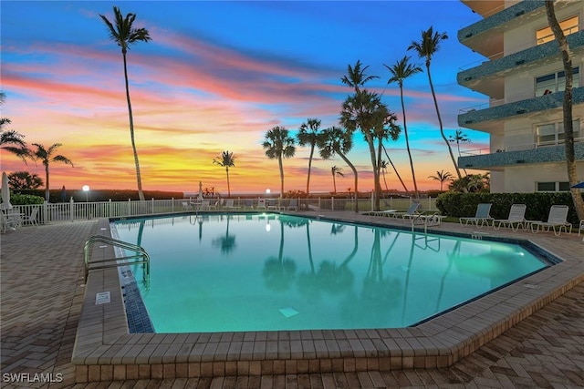 220 Seaview Ct Unit 305, Marco Island, FL 34145 - community pool featuring fence and a patio