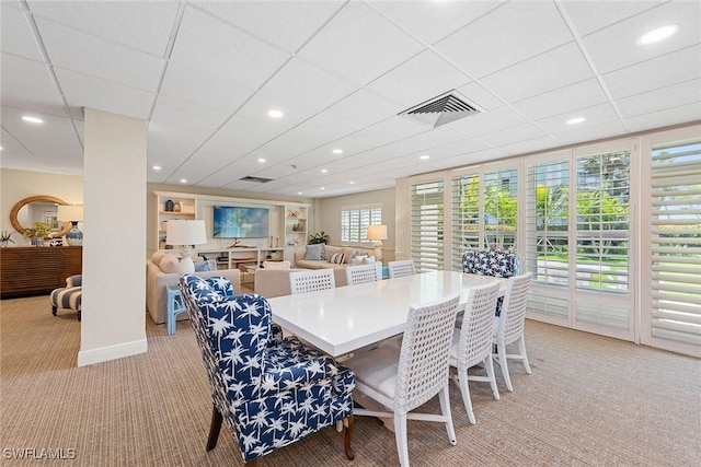220 Seaview Ct Unit 305, Marco Island, FL 34145 - dining area featuring baseboards, light colored carpet, visible vents, recessed lighting, and a drop ceiling