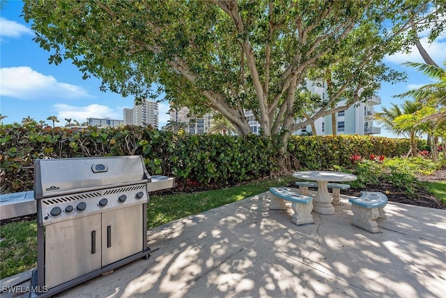 220 Seaview Ct Unit 305, Marco Island, FL 34145 - view of patio / terrace featuring area for grilling
