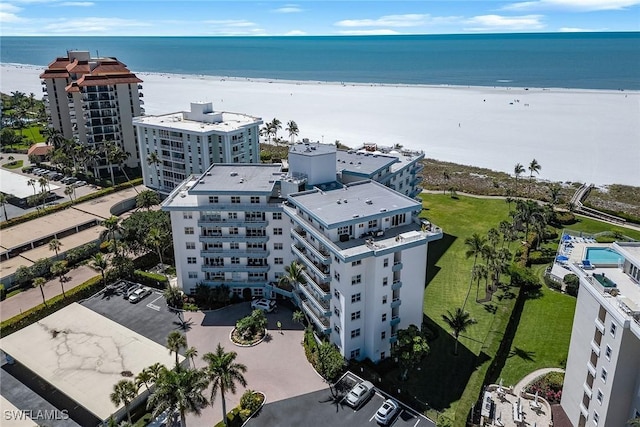 220 Seaview Ct Unit 305, Marco Island, FL 34145 - drone / aerial view featuring a water view and a view of the beach