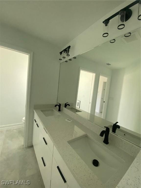 4108 35th St SW, Lehigh Acres, FL 33976 - full bathroom featuring double vanity and toilet
