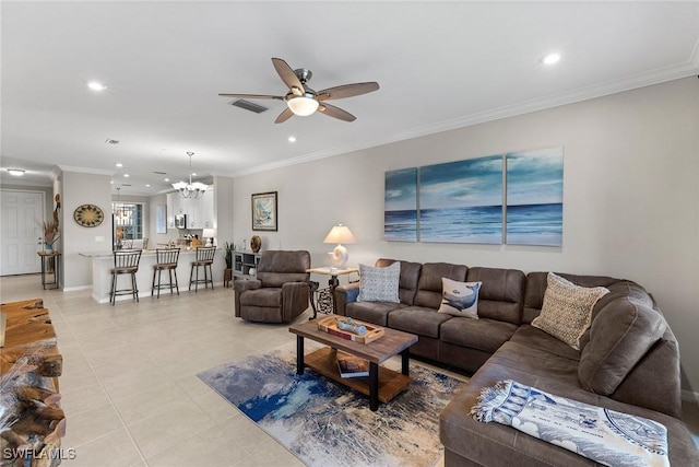 living room featuring visible vents, ceiling fan with notable chandelier, recessed lighting, light tile patterned flooring, and crown molding