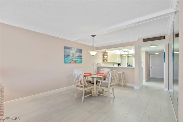25900 Hickory Blvd Unit 405, Bonita Springs, FL 34134 - dining room with beamed ceiling and baseboards