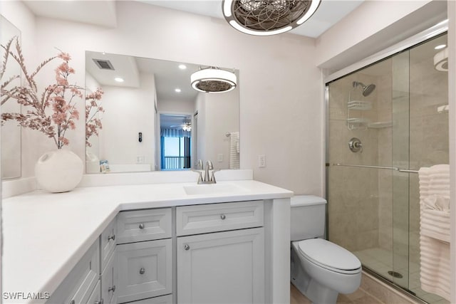 25900 Hickory Blvd Unit 405, Bonita Springs, FL 34134 - bathroom with a stall shower, vanity, toilet, and recessed lighting