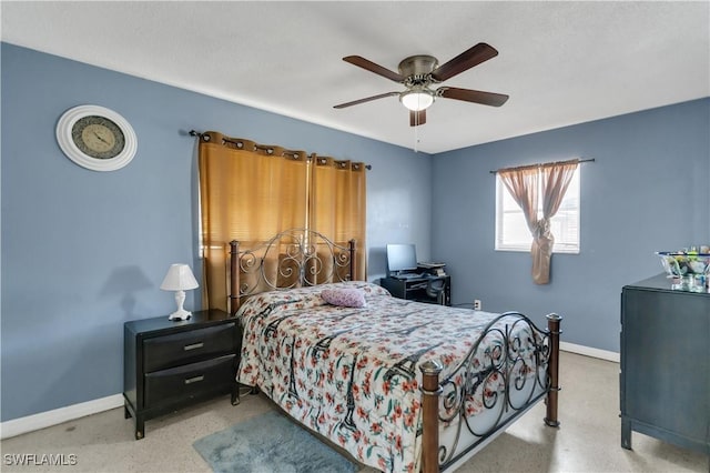 bedroom featuring a ceiling fan and baseboards