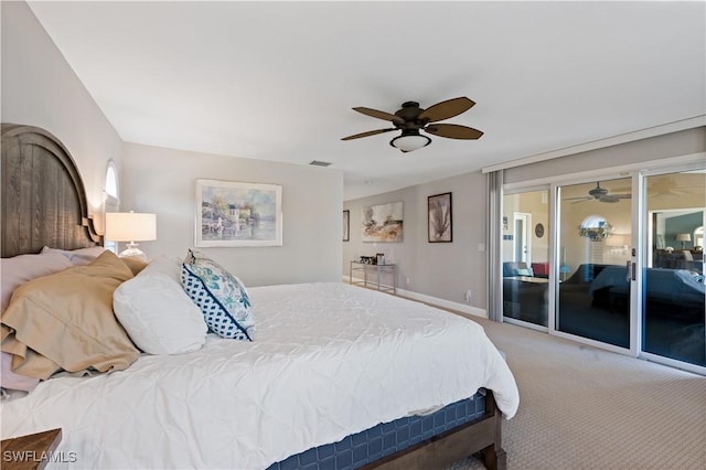 carpeted bedroom featuring a ceiling fan, access to exterior, baseboards, and visible vents