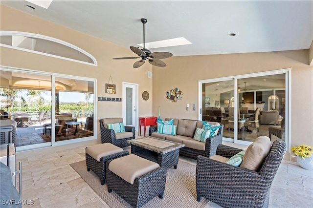 view of patio / terrace with an outdoor living space and ceiling fan