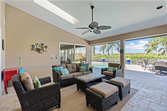 view of patio with an outdoor pool, a ceiling fan, and outdoor lounge area