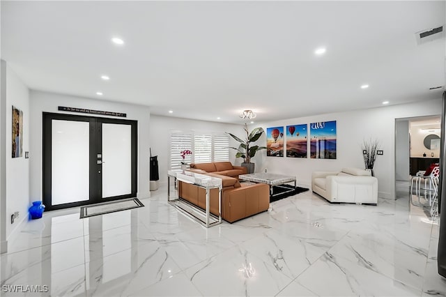 living room with recessed lighting, visible vents, and marble finish floor