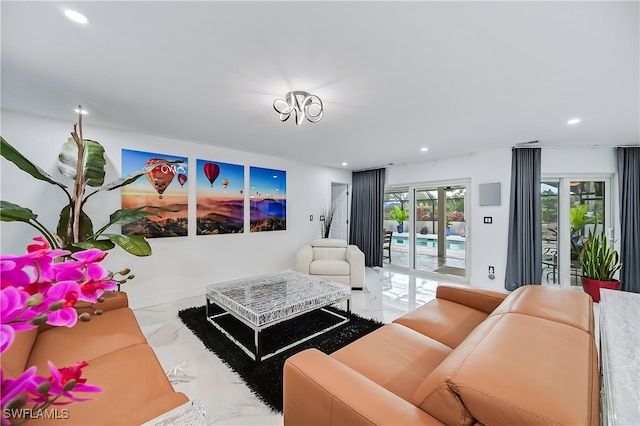 living area featuring recessed lighting and marble finish floor