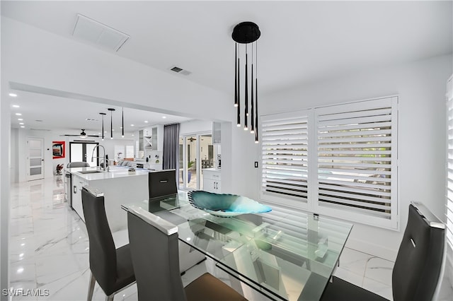 dining area with a ceiling fan, recessed lighting, visible vents, and marble finish floor