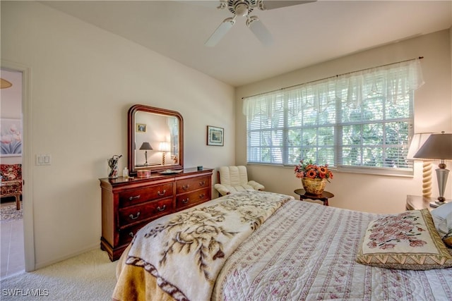8664 Patty Berg Ct, Fort Myers, FL 33919 - bedroom with baseboards, carpet floors, and ceiling fan