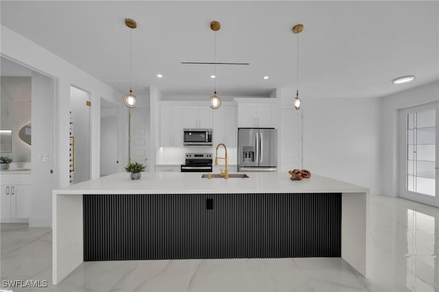 kitchen with a sink, stainless steel appliances, light countertops, white cabinetry, and marble finish floor