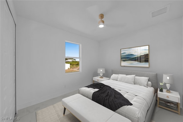 bedroom featuring visible vents, ceiling fan, and baseboards