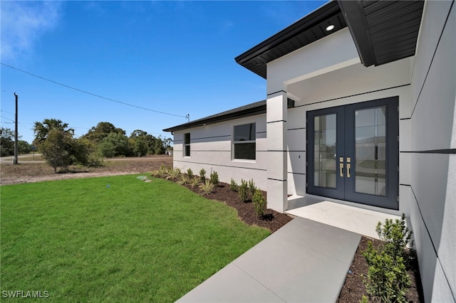 view of yard with french doors