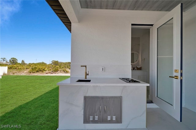 exterior space featuring area for grilling and a sink