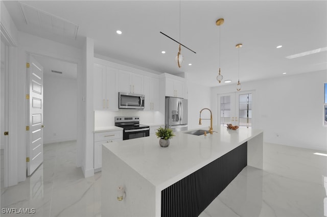 kitchen with marble finish floor, a sink, a spacious island, appliances with stainless steel finishes, and white cabinets