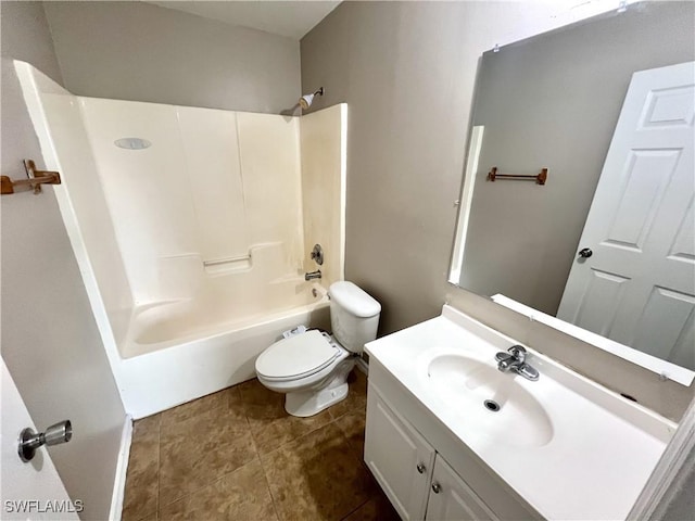 bathroom with tile patterned flooring, shower / washtub combination, toilet, and vanity