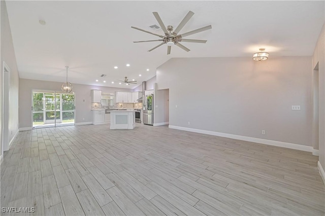 unfurnished living room featuring light wood-type flooring, visible vents, baseboards, lofted ceiling, and ceiling fan