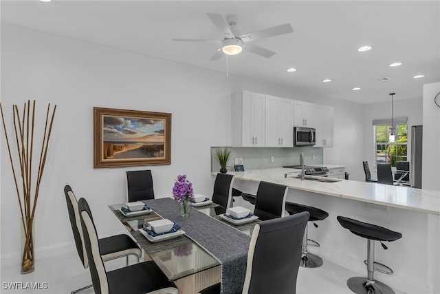 dining area with visible vents, recessed lighting, baseboards, and ceiling fan