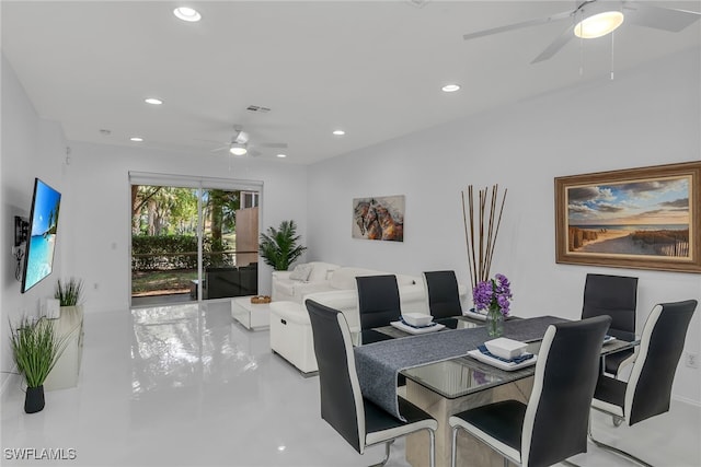 dining room with finished concrete flooring, recessed lighting, and a ceiling fan