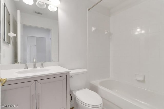 bathroom with visible vents, toilet, shower / bath combination, and vanity