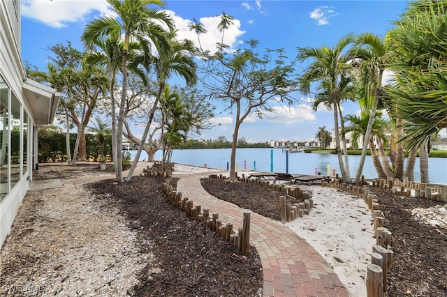 property view of water with a dock