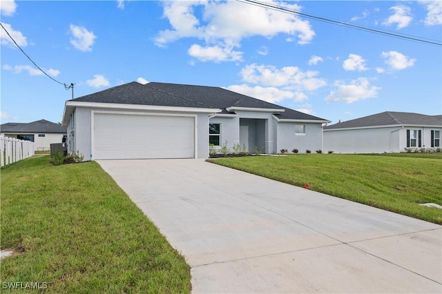 single story home with a front lawn, a garage, driveway, and stucco siding