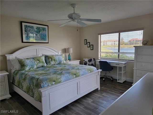 bedroom with baseboards, ceiling fan, and wood tiled floor