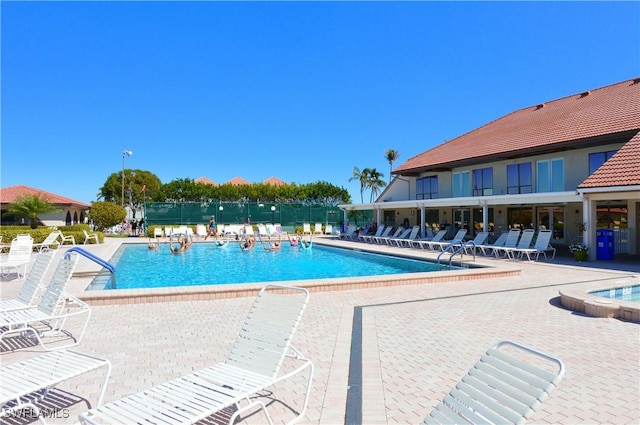 community pool with a patio