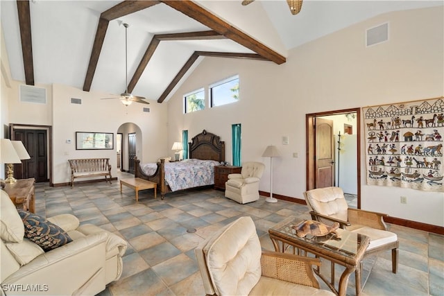 bedroom featuring arched walkways, visible vents, freestanding refrigerator, and beam ceiling