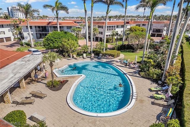 community pool with a patio