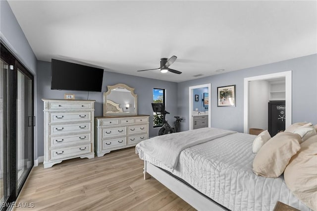 bedroom with visible vents, light wood-style floors, and a ceiling fan