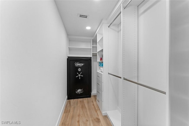 spacious closet featuring light wood finished floors and visible vents