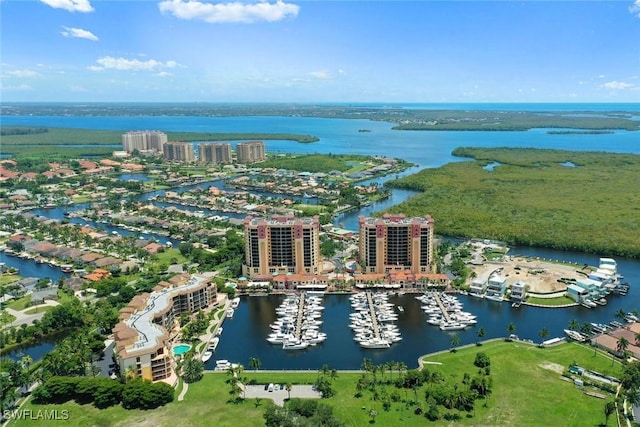 bird's eye view featuring a view of city and a water view