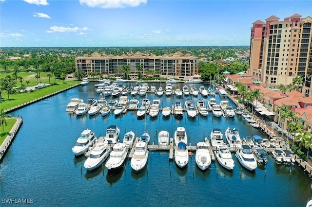 birds eye view of property with a water view