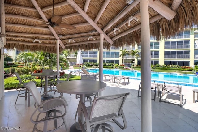 pool featuring a gazebo and a patio area