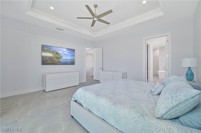 bedroom with a raised ceiling, visible vents, and ornamental molding