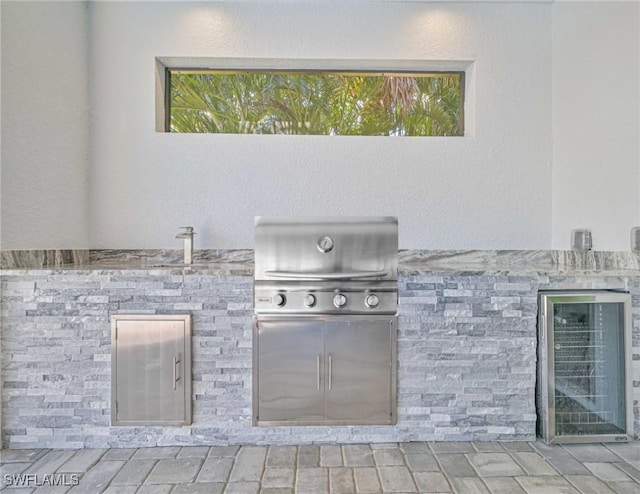 view of patio / terrace with grilling area and an outdoor kitchen