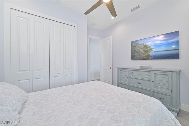 bedroom with visible vents, baseboards, a closet, and ceiling fan