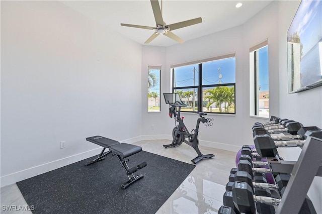 exercise area featuring recessed lighting, baseboards, and ceiling fan