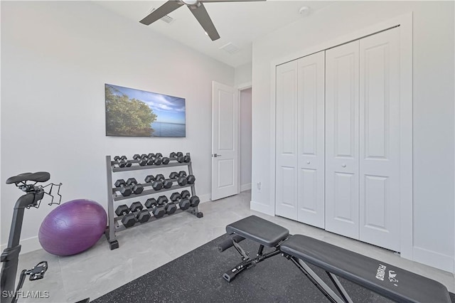 exercise area with visible vents, baseboards, and ceiling fan