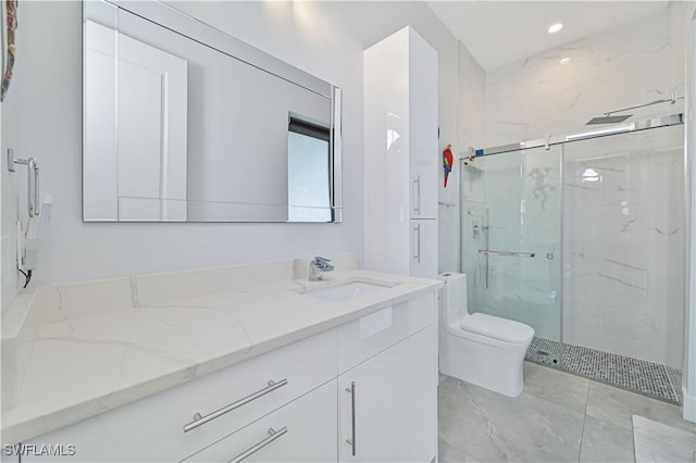 bathroom featuring a marble finish shower, recessed lighting, toilet, and vanity