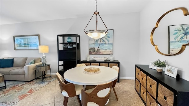 10139 Colonial Country Club Blvd S Unit 1006, Fort Myers, FL 33913 - dining space featuring light tile patterned flooring and baseboards