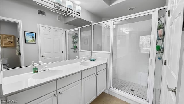 10139 Colonial Country Club Blvd S Unit 1006, Fort Myers, FL 33913 - full bathroom with a sink, double vanity, visible vents, and a shower stall