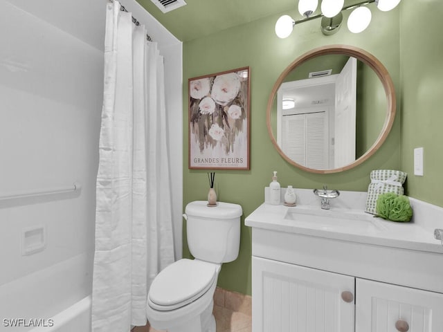 bathroom with vanity, toilet, visible vents, and tile patterned flooring