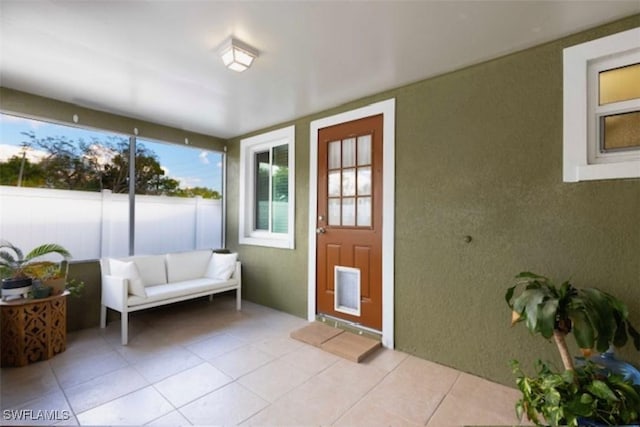 unfurnished sunroom with a wealth of natural light