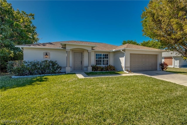 ranch-style home featuring a garage, concrete driveway, a front yard, and stucco siding