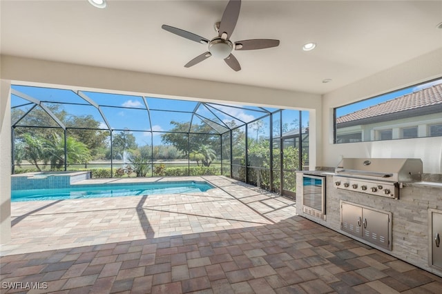 view of swimming pool featuring area for grilling, a ceiling fan, a patio, a grill, and a lanai